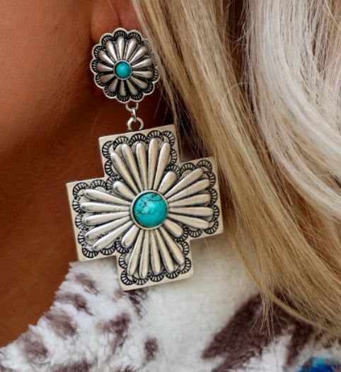 Carved Earrings From a Bohemian Cross