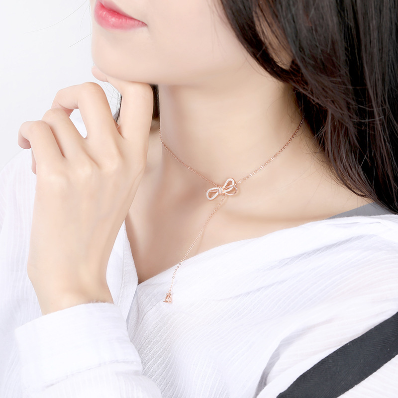 Bow-Knot Round & Pear Cut Sterling Silver Necklace
