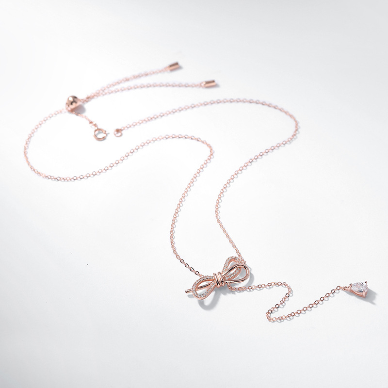 Bow-Knot Round & Pear Cut Sterling Silver Necklace