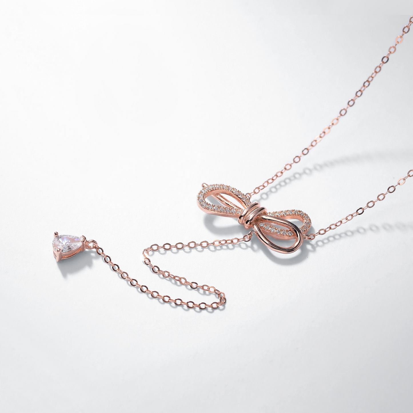 Bow-Knot Round & Pear Cut Sterling Silver Necklace