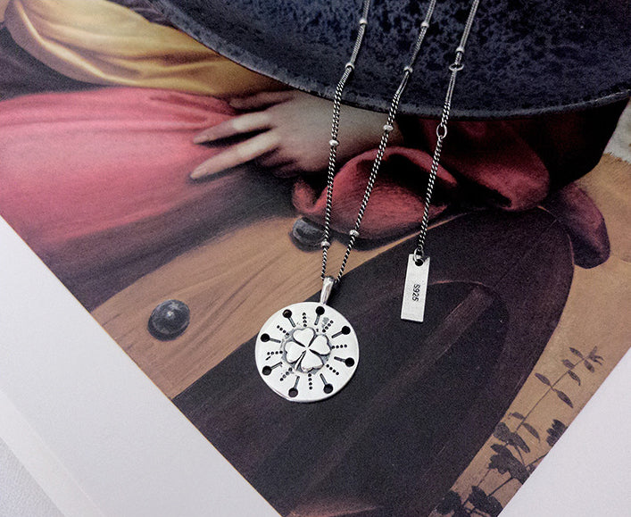 Carved Four-leaf Clover Sterling Silver Necklace